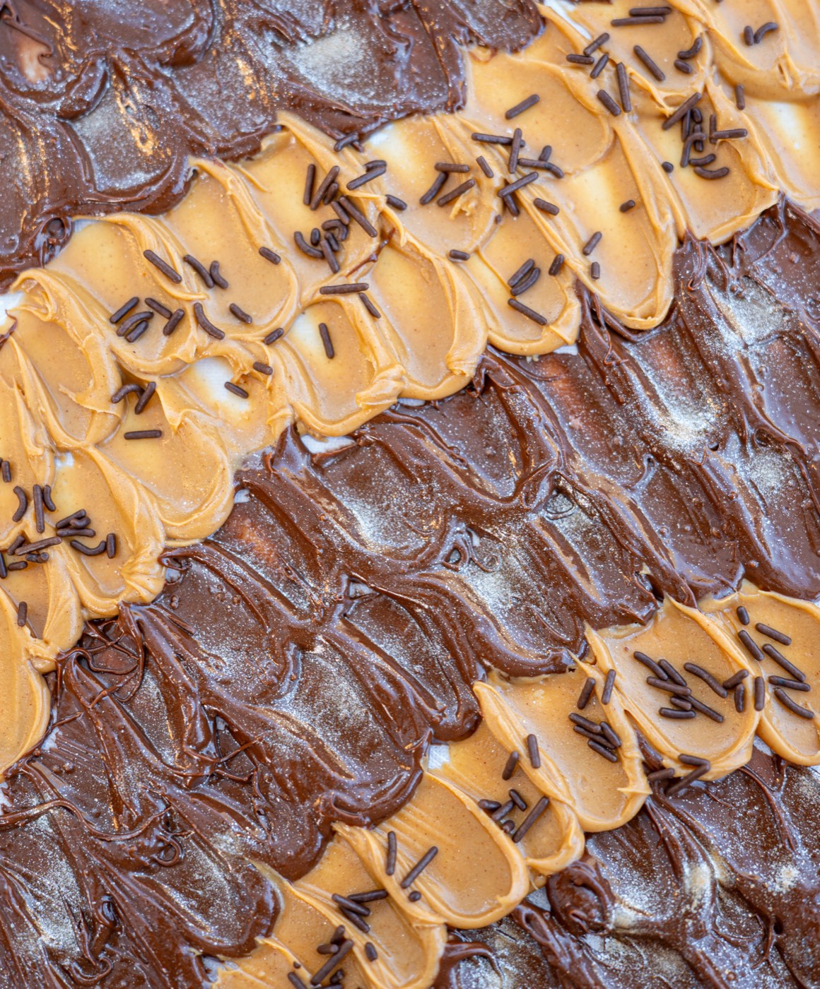 Pretzels cubiertos de chocolate y botanas premium del menú Premium